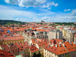 Obraz premium View of the city of Prague from the Old Town Hall with a view of Prague Castle, Strahov Monastery and Petrin Hill