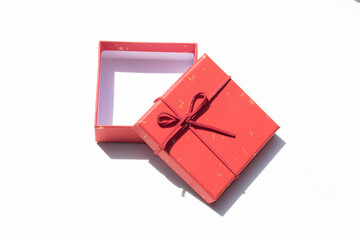 Unwrapped Red Gift Box on Minimal White Background