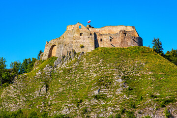 Ruins of medieval royal Czorsztyn Castle over Jezioro Czorsztynskie lake and reservoir of Dunajec river in Pieniny mountains of Lesser Poland