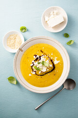 Homemade pumpkin soup with Feta cheese