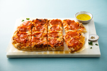 Traditional Pepperoni pizza with truffle oil