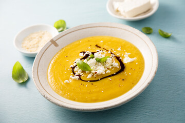 Homemade pumpkin soup with Feta cheese