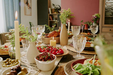 Medium close up of gourmet snacks and fresh vegetable on table serving with crystal kitchenware