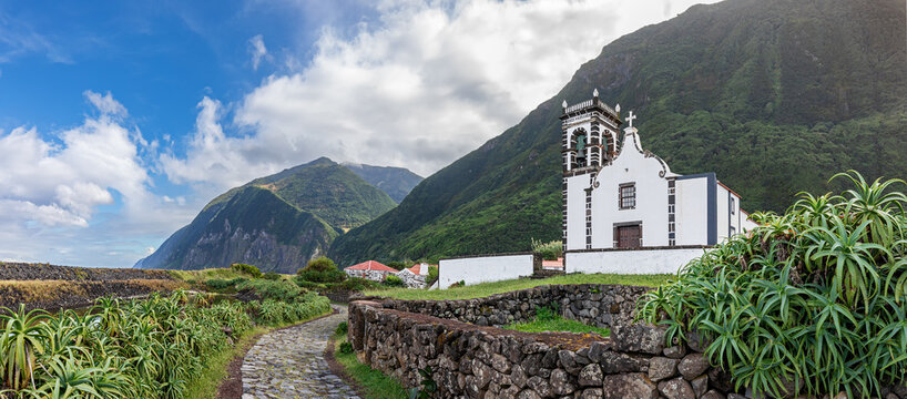 Panoramic view of small village Faja da Caldeira de Santo Cristo with church Santuario do Senhor Santo Cristo - Faj&atilde; da Caldeira at Sao Jorge Island - Azores