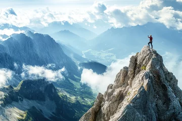 Determined individual conquers mountain peak under dramatic sunset in breathtaking landscape