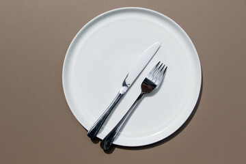 Minimal Ceramic Plate from Above as Symbol of Table Etiquette