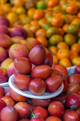 Tamarillo (Solanum betaceum) fruit on local fruit and vegetable market, Quito, Ecuador.