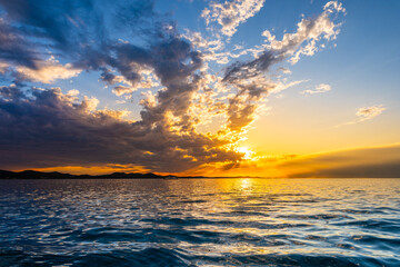 Scenic view of a golden summer sunset in Zadar in Croatia
