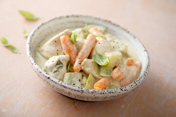 Chicken ragout with vegetables and cream