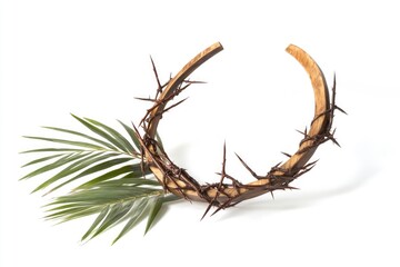Obraz premium Crown of thorns with wooden cross and palm leaf on white background. Good Friday concept 