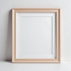 A photo frame with a neutral-colored border, photographed on a white surface.
