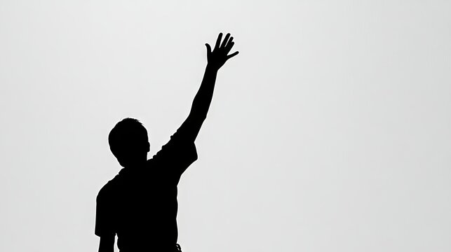Silhouette of a Person Raising a Hand Against a White Background