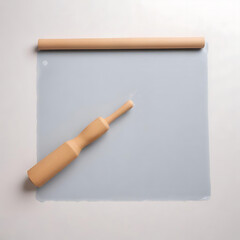 A silicone baking mat with a rolling pin, placed on a clean white surface.