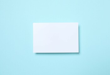 White paper card on color background