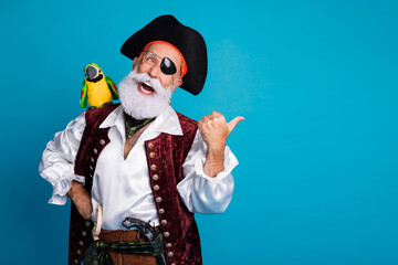 Photo of funky hilarious pirate actor wear costume halloween carnival look empty space isolated on...