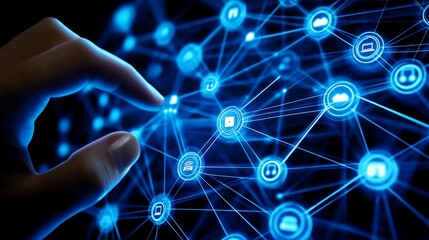 A hand interacting with a digital network of interconnected icons and symbols.
