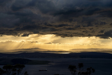 dawn golden sunrise over hobart over the ocean