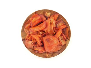 Keripik singkong or cassava chips sweet and spicy on wooden plate isolated on white background. Top view angle setup. Indonesian culinary 