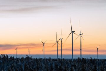 A large wind farm in Northern Finland on a freezing cold winter morning