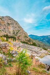 Delphi with ruins of the Temple of the ancient Sanctuary of Apollo in Delphi, Greece, at the Mount...