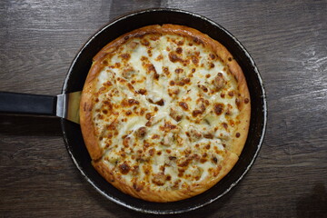 pizza in a frying pan