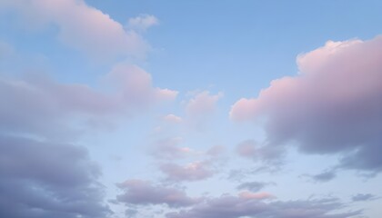 Sky with clouds in pastel shades of pink and purple