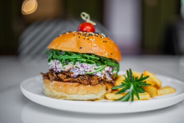 Burger and fries on a plate