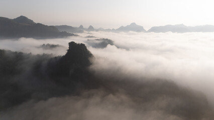 Clouds on high mountain peaks in the rainy season in the Asian rainforest..