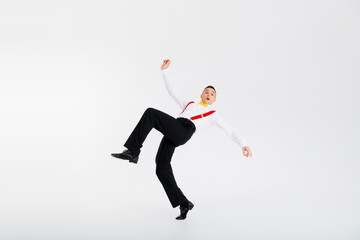 Full size photo of classy young man perform dance vintage outfit isolated on white color background