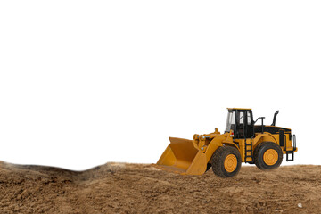 Wheel loader digging soil in the construction site on isolated white background.