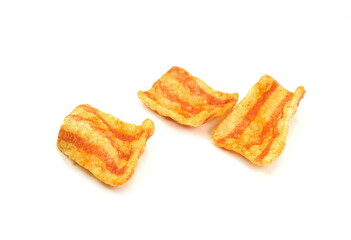 Bacon Chips. Delicious bacon snacks isolated on white background. Pelleted salted snack bacon. Smoked bacon flavored chips.
