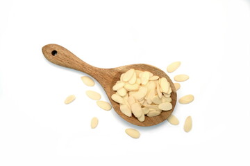 almond flakes in a wooden spoon isolated on white