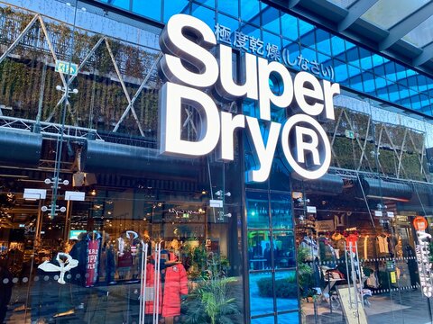Bracknell, England - January 09, 2025: The entrance and shop sign of the SuperDry fashion clothing store in Bracknell, England 