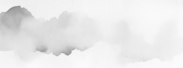 Soft gray watercolor textures on high-quality paper create an elegant atmosphere for artistic expression in serene settings