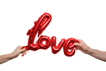 A pair of hands grasp a bright red balloon that spells out the word love. The background is plain white, emphasizing the colorful balloon and the expression of affection in a celebratory moment.