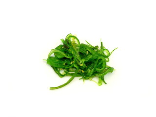 Heap of organic Japanese Wakame salad isolated on white background. Edible Green Algae, Sea Vegetable Isolated. Green Chuka Seaweed Salad Isolated on White Background. Edible Seaweed 