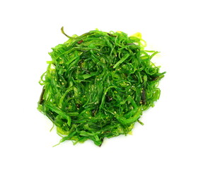 Heap of organic Japanese Wakame salad isolated on white background. Edible Green Algae, Sea Vegetable Isolated. Green Chuka Seaweed Salad Isolated on White Background. Edible Seaweed 