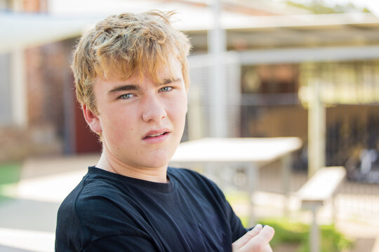 Close up portrait of relaxed teenager with serious expression