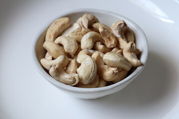 Cashew nut seed snack fruit on white background