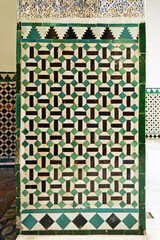 Mosaic tiles in the Alcazar of Seville, Andalusia, Spain. Mudejar Palace of Reales Alcazares. Door jamb of azulejos alicatados of Al Andalus