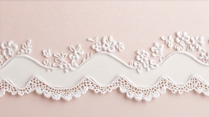 Delicate white floral lace on a pale pink background