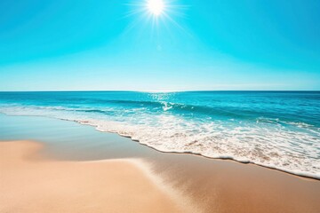 Obraz premium A serene beach scene with golden sand and clear blue water under a bright sun.