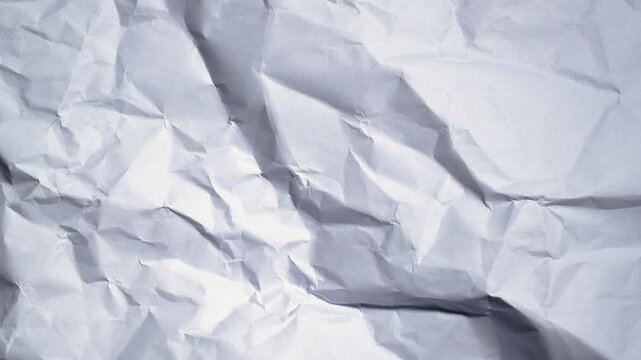 Crumpled paper texture White crumpled sheet stop motion seamless loop