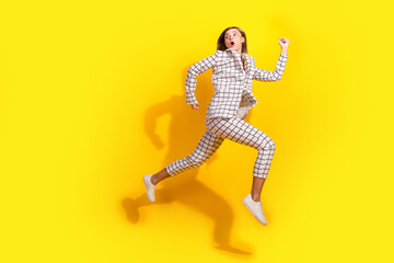 Full size photo of pretty young girl running turn around escape look empty space wear white...