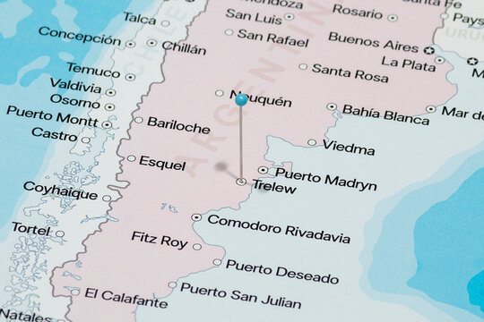 Macro photo of a light blue pin needle into Trelew city of Argentina political map 