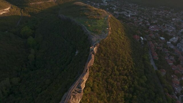 Aerial view of Ovech Fortress on a hill during sunset, Provadia, Bulgaria.