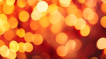 Fototapeta premium Blurred Autumn Leaves in Warm Orange and Red Tones with Bokeh Effect and Copy Space