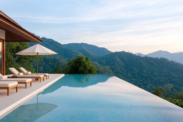 Obraz premium stunning infinity pool overlooking lush green mountains, with sun loungers and umbrella, creates serene and tranquil atmosphere. Perfect for relaxation and enjoying nature beauty