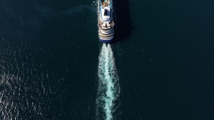Kusadasi, Turkey - 01 December 2024: Aerial view of a beautiful cruiseship on the Aegean Sea, Kusadasi, Turkey.