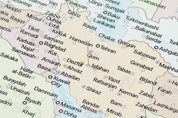 Macro photo of a white pin needle into Isfahan city of Iran political map 